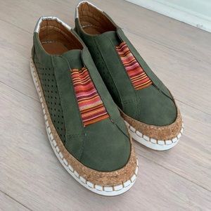 Green slip on sneakers